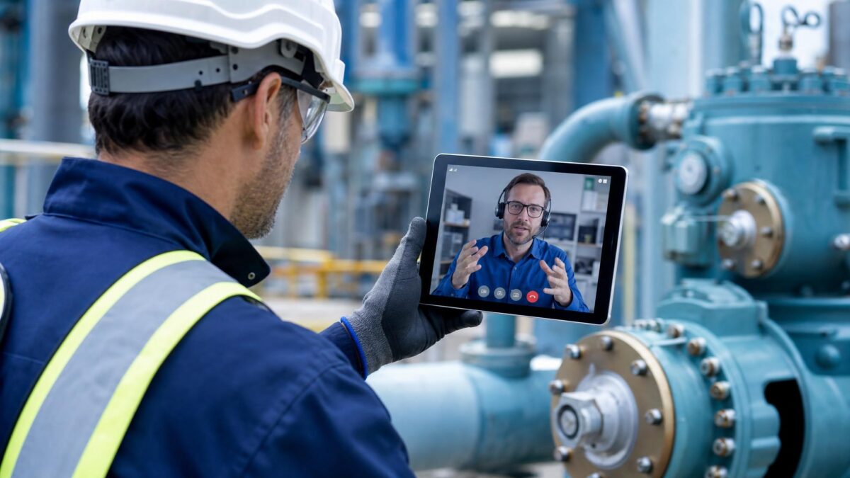 technician using tablet for first-time fix rate improvement with remote support